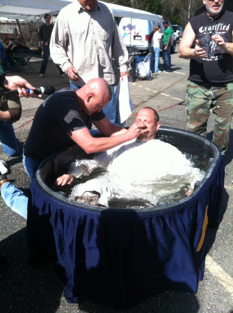 Gary Don Holley baptizing a young man that received Christ as his savior